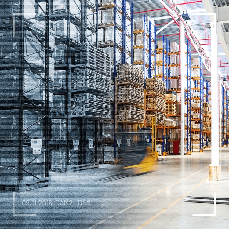 CCTV example of a warehouse with pallets stacked in racking.