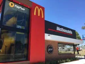 CCTV security camera installation at McDonald's, showcasing surveillance systems in a fast food restaurant for safety and monitoring.
