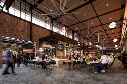 CCTV and communication system setup in a bustling indoor food market, showcasing the importance of surveillance and security solutions for commercial spaces.
