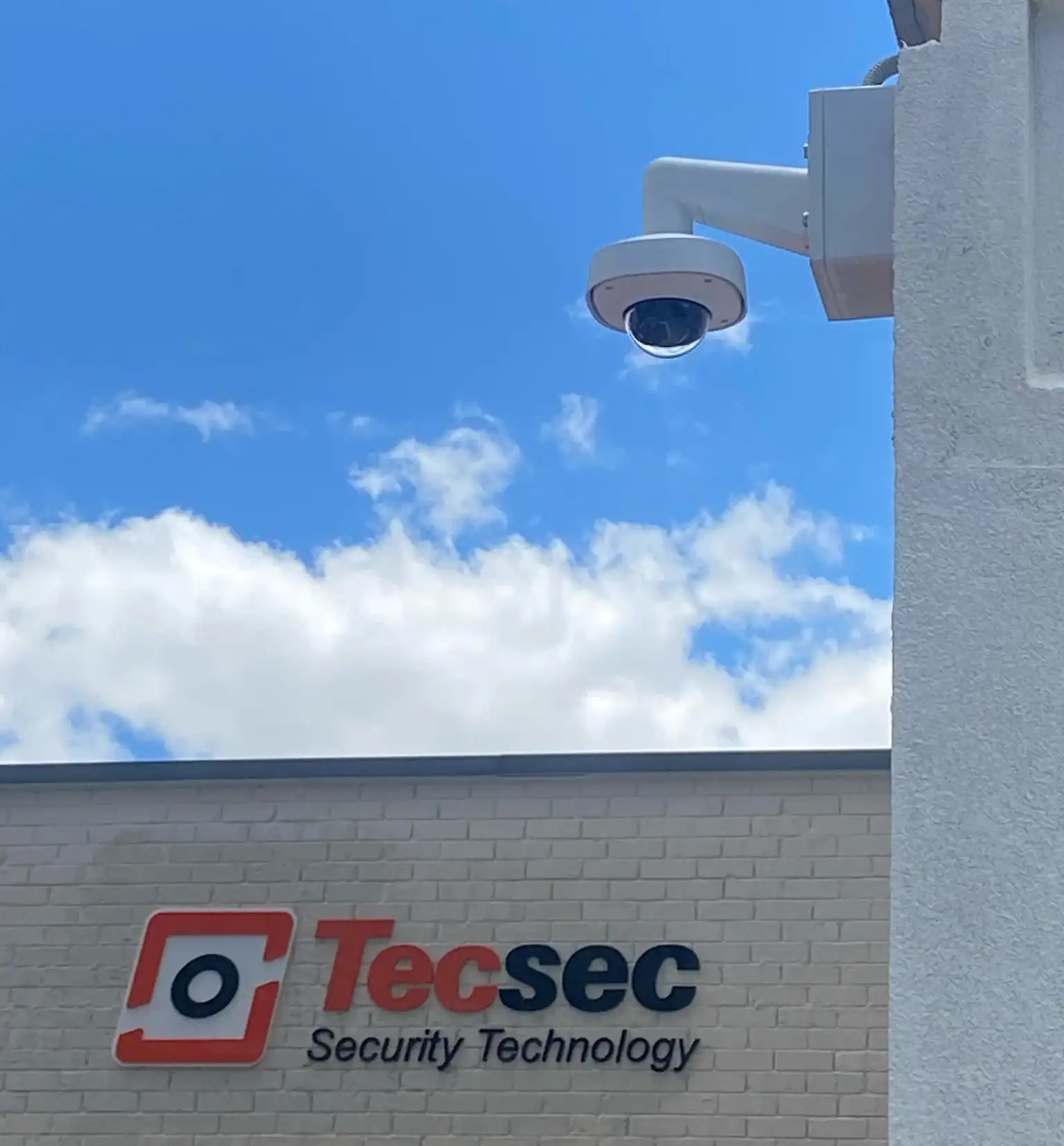 CCTV security camera mounted on building exterior for surveillance and security monitoring.