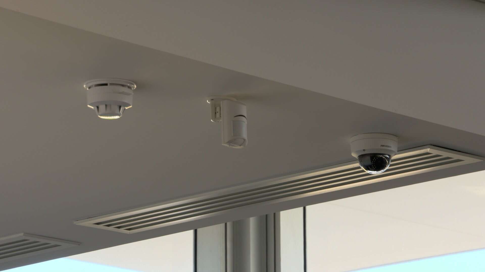 CCTV security cameras installed on a ceiling, showcasing surveillance technology for enhanced property security and communication. Perfect for business or home security systems.