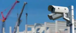 High-definition CCTV security camera installed at a construction site, providing comprehensive surveillance and safety monitoring.