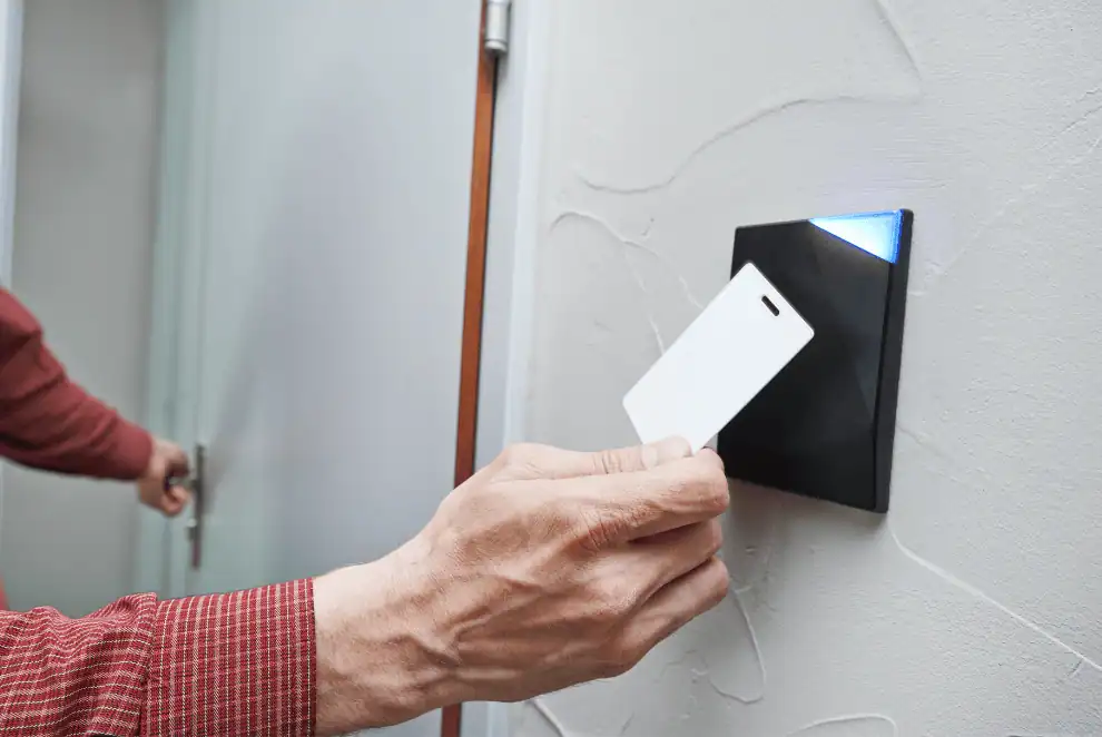 Card access being granted at a secure entrance with CCTV monitoring, showcasing modern security systems for commercial and residential properties.